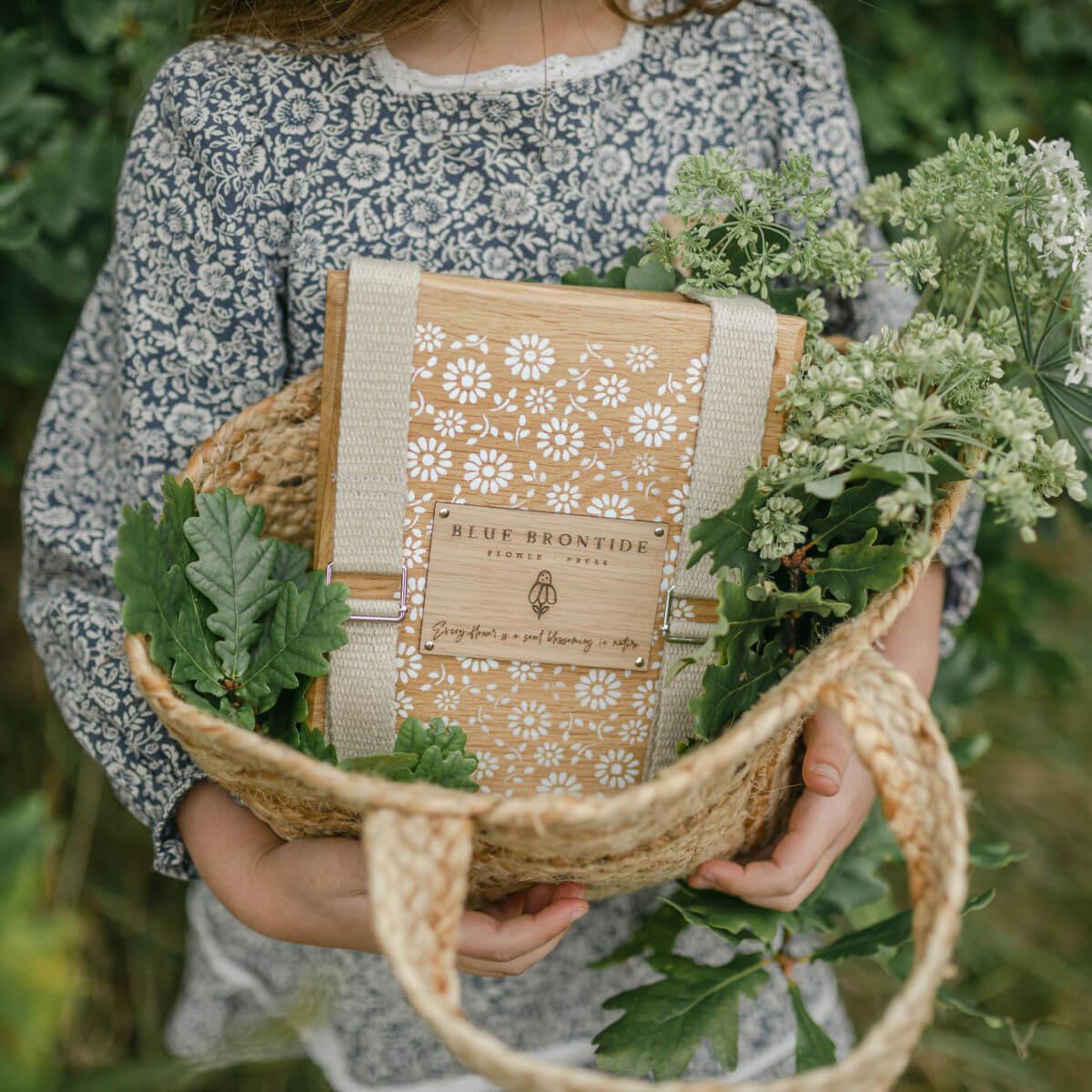 wooden flower press with straps in delicate daisy, flower pressing at blue brontide uk