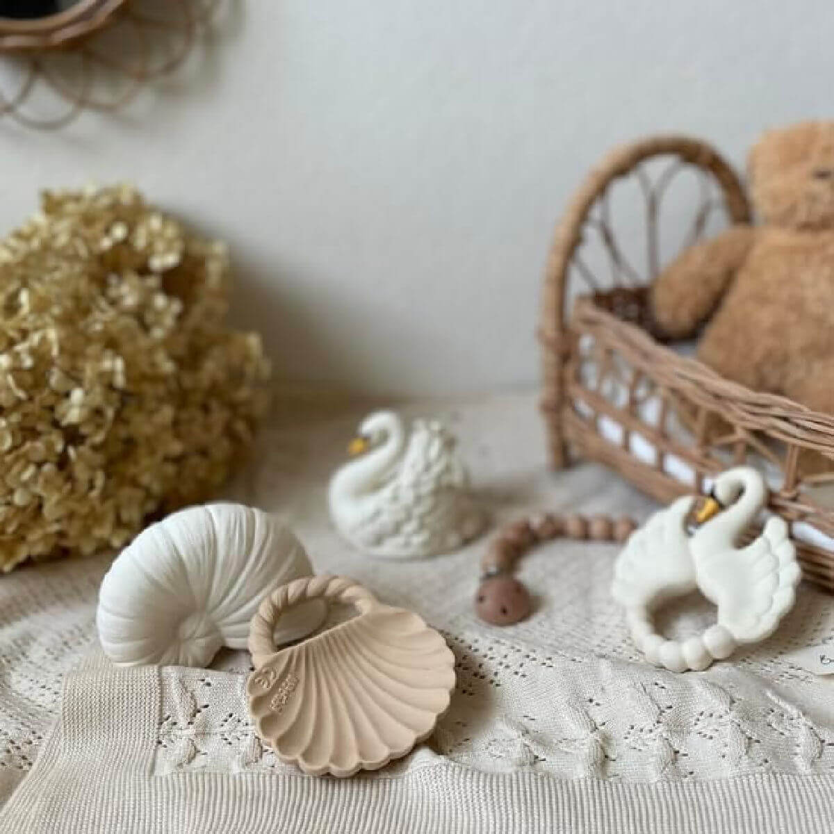 Eco-friendly shell-shaped baby toys displayed in a Montessori nursery – made from safe, plastic-free natural rubber