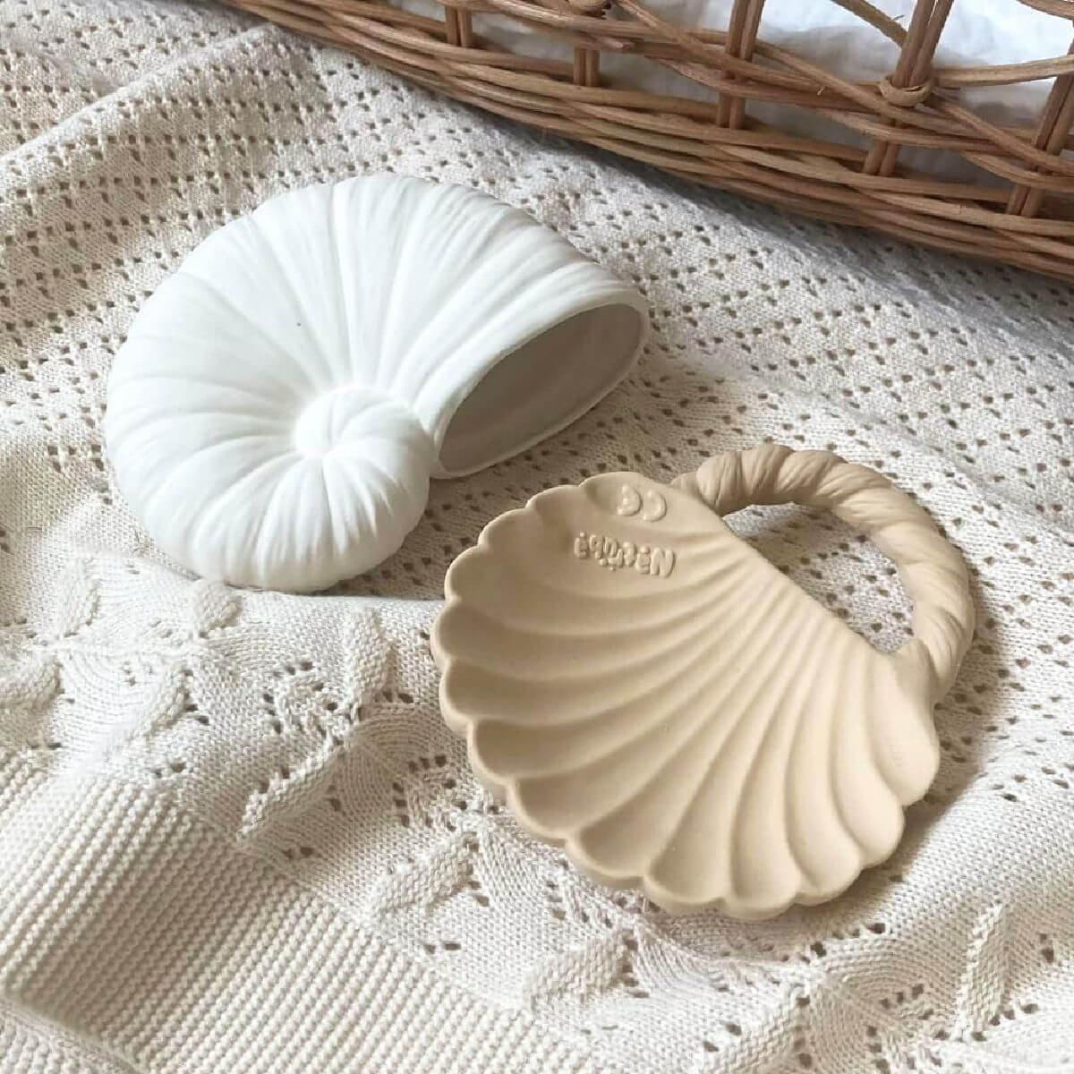 Sustainable rubber bath toys for babies styled in a calm, minimalist nursery setting