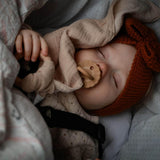 natruba organic cotton comforter and natural rubber teething ring in creme