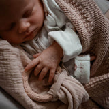 natruba organic cotton comforter and natural rubber teething ring in creme