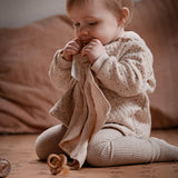 natruba organic cotton comforter and natural rubber teething ring in creme