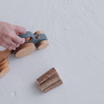 Montessori-style wooden tractor toy in toddler nursery play scene video