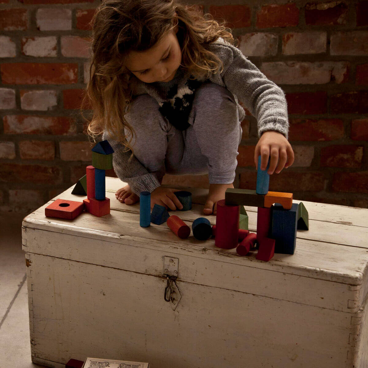 wooden building blocks in sack 100 pieces in rainbow colours by wooden story