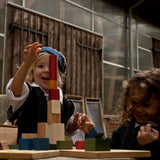 wooden building blocks in sack 100 pieces in rainbow colours by wooden story