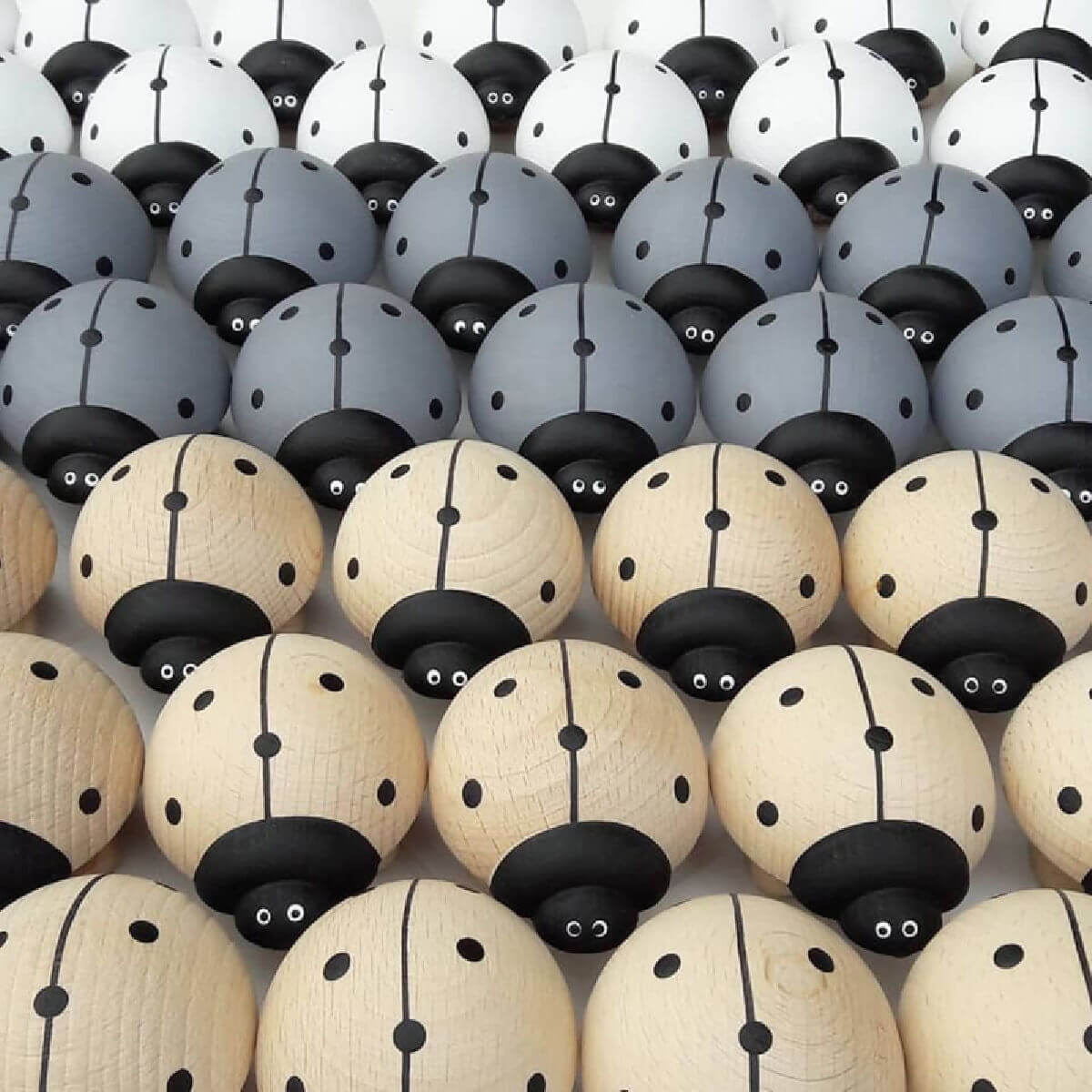 othat wooden push along toy ladybird in natural