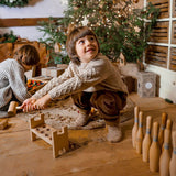 pound a peg Montessori wooden toy by wooden story