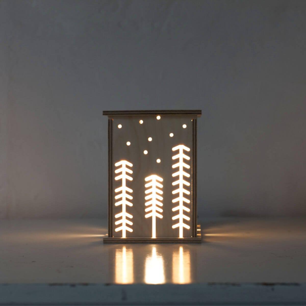 wooden nursery night light in woodland by bright corner UK