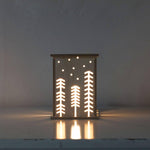 wooden nursery night light in woodland by bright corner UK
