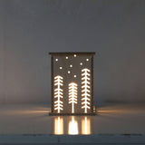 wooden nursery night light in woodland by bright corner UK