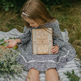 wooden flower press with straps in delicate daisy, flower pressing at blue brontide uk