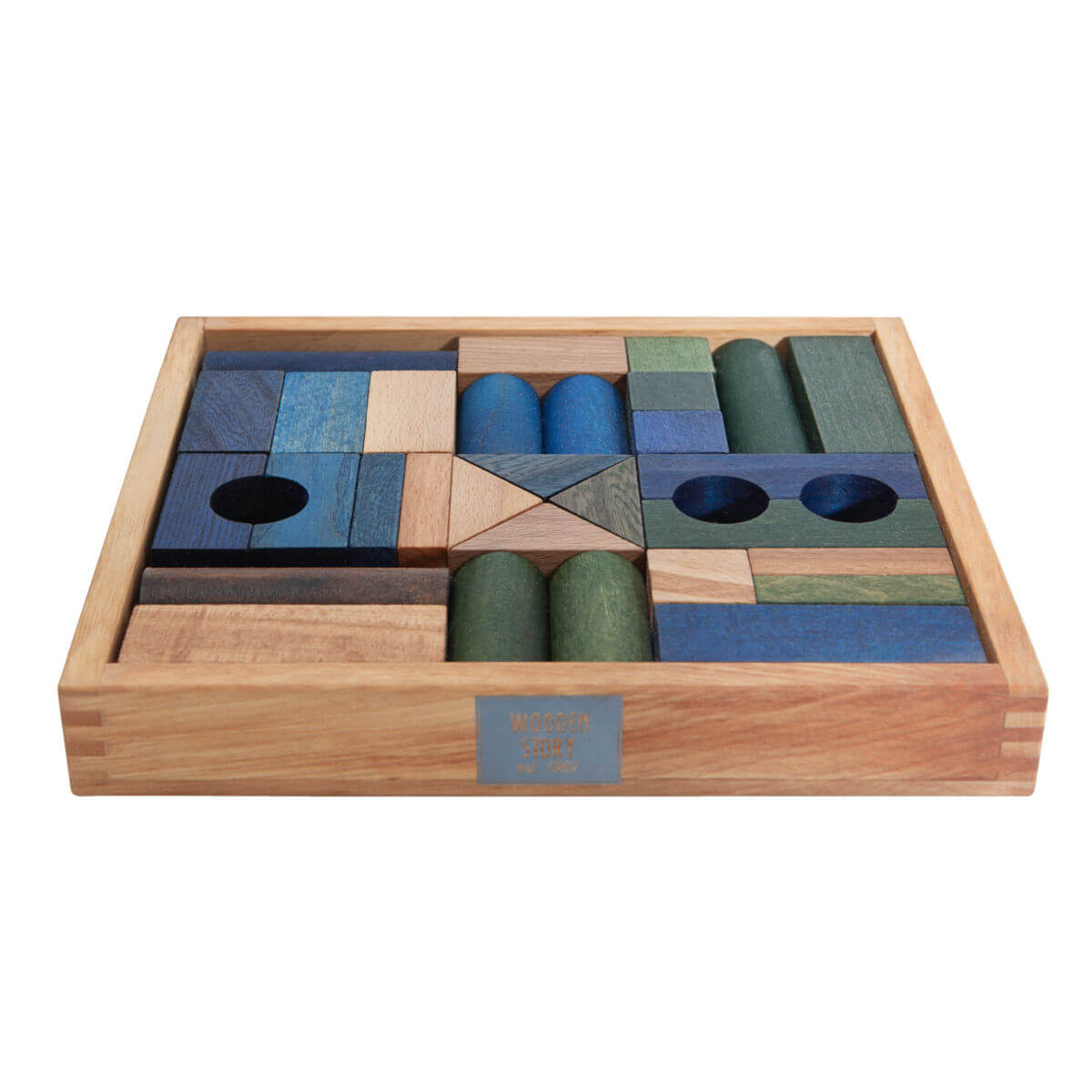 wooden building blocks in tray in cool colours by wooden story