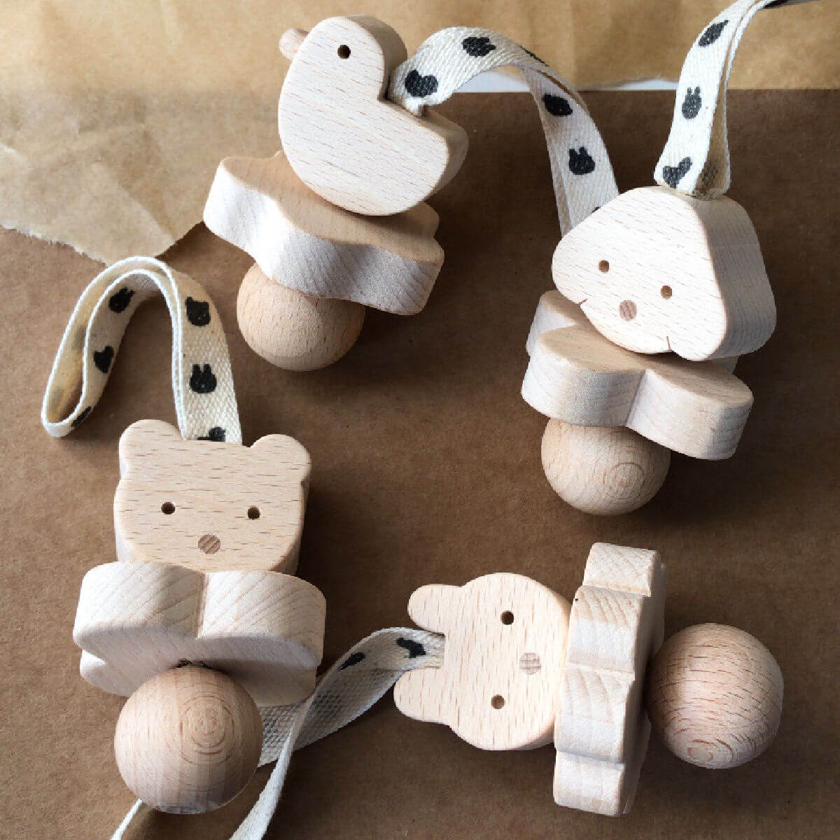 wooden rattle in duck design minus range by KMR childwood