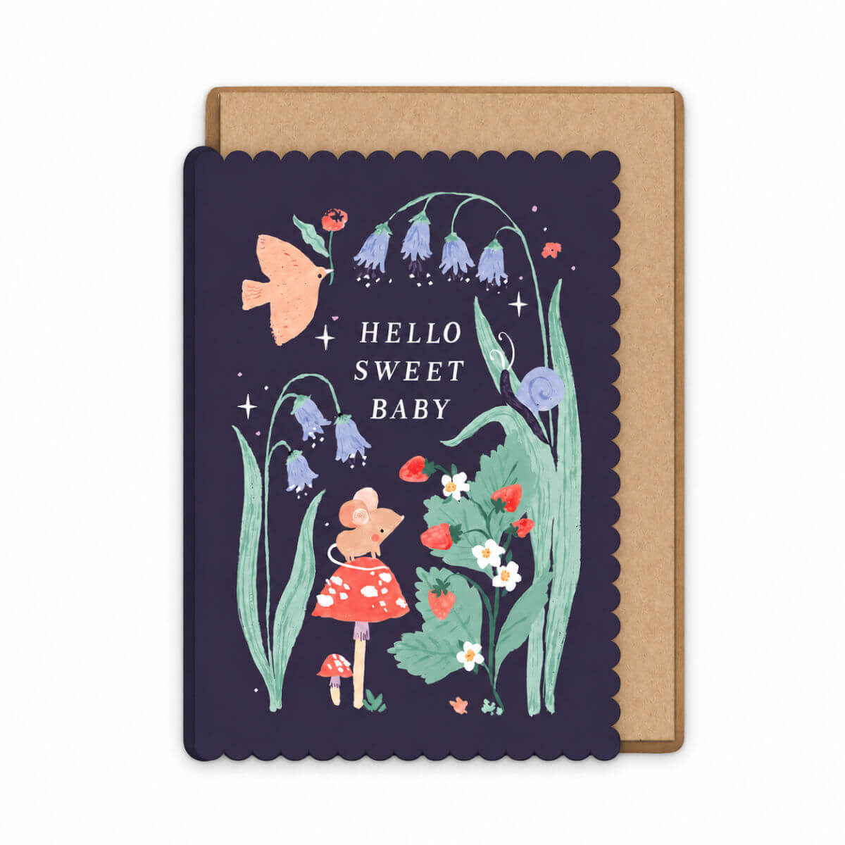 Woodland new baby greeting card with a scalloped dark navy border and a kraft paper envelope illustrated by Sister Paper Co. The card features whimsical floral artwork with bluebells, a bird, a small mouse in a red dress, flowers, and the text 'HELLO SWEET BABY'.