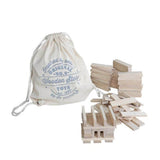 architectural wooden building blocks in cotton sack by wooden story