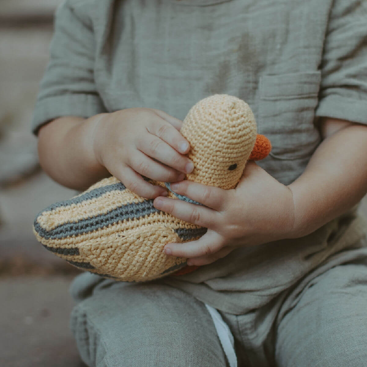 crochet baby rattle in yellow duck design by pebblechild