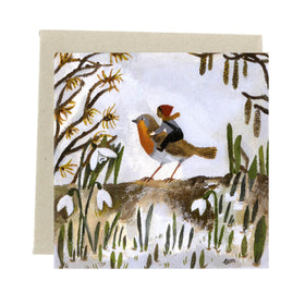 Greeting card with a winter scene featuring a robin and snowdrops on a white background by British illustrator Gemma Koomen.