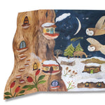 Winter magic advent calendar with treehouse design and snowy landscape by Gemma Koomen