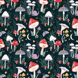 A repeating forest-themed pattern featuring red and white mushrooms, pale pink snails, lavender-purple mushrooms, green leaves, small yellow stars, and cream moons on a very dark teal background gift wrapping illustrated by sister paper co