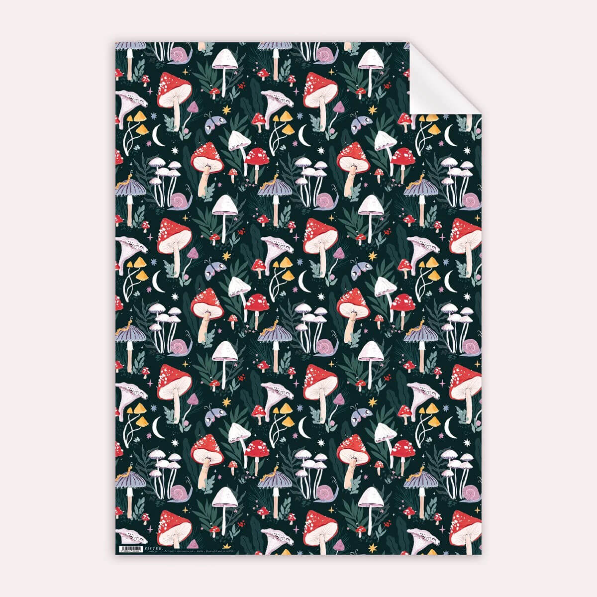 Patterned gift wrapping paper with colourful mushrooms on a dark background illustrated by sister paper co
