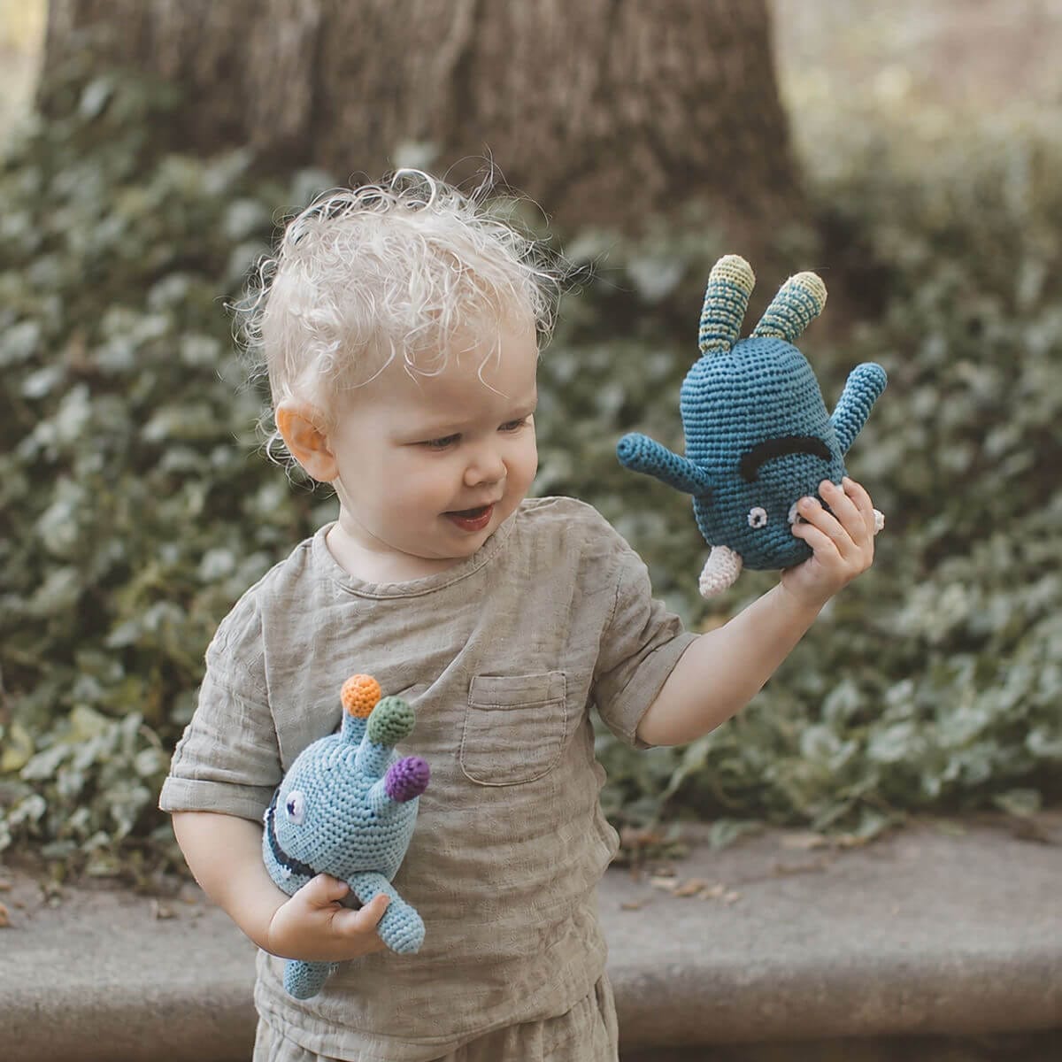 monster baby rattle toys being played with 