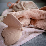 butterfly baby rattle in natural rubber by natruba