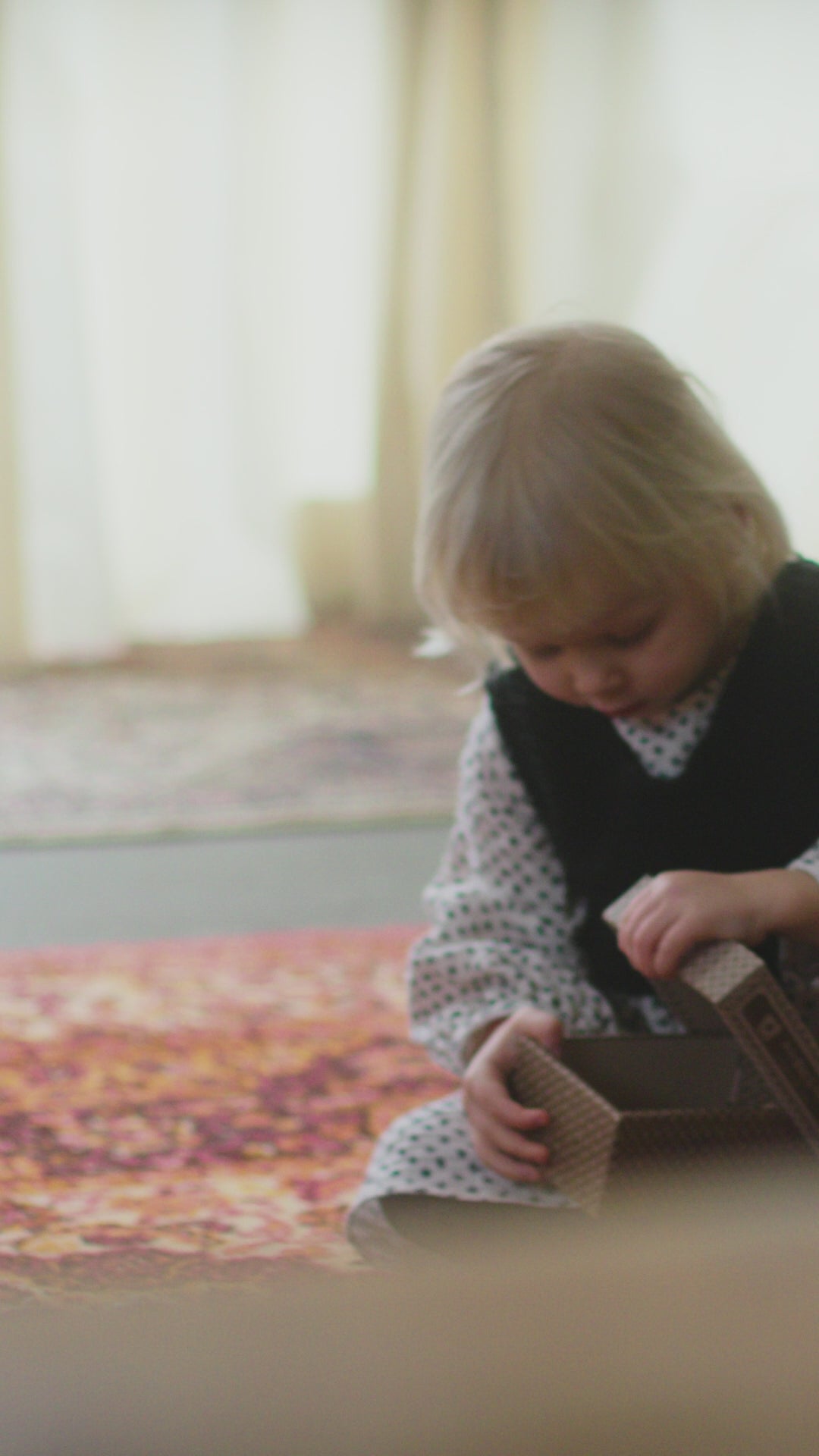 push along wooden toy duck being played  with movie