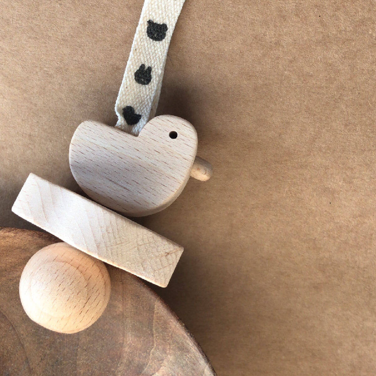 wooden rattle in duck design minus range by KMR childwood