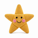 crochet baby rattle in yellow star design with smiley face