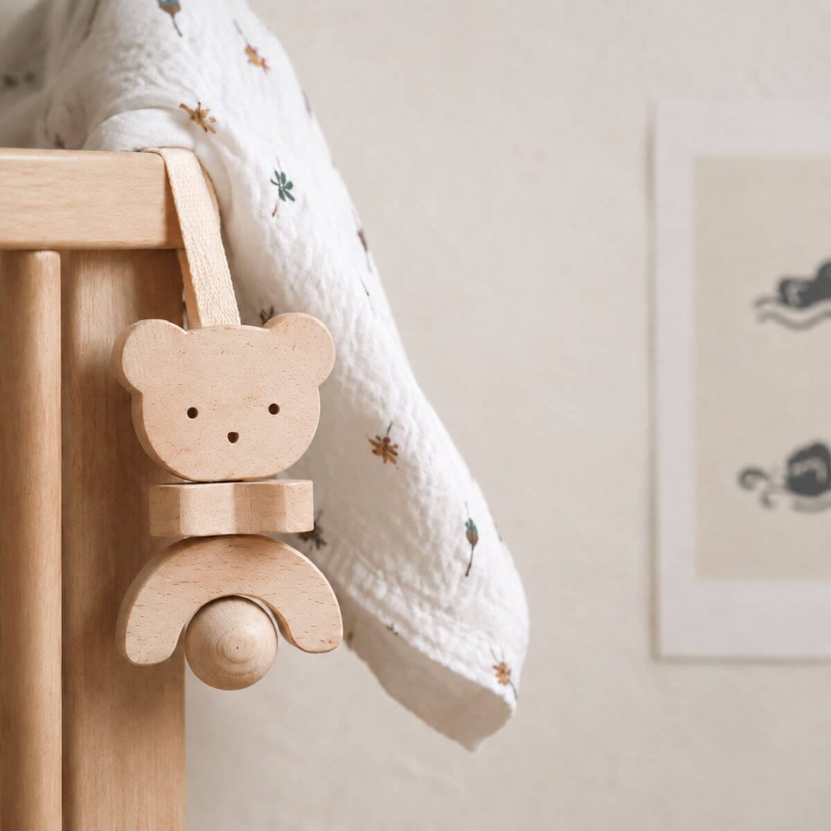 wooden bear baby rattle in nursery setting by KMR childhood