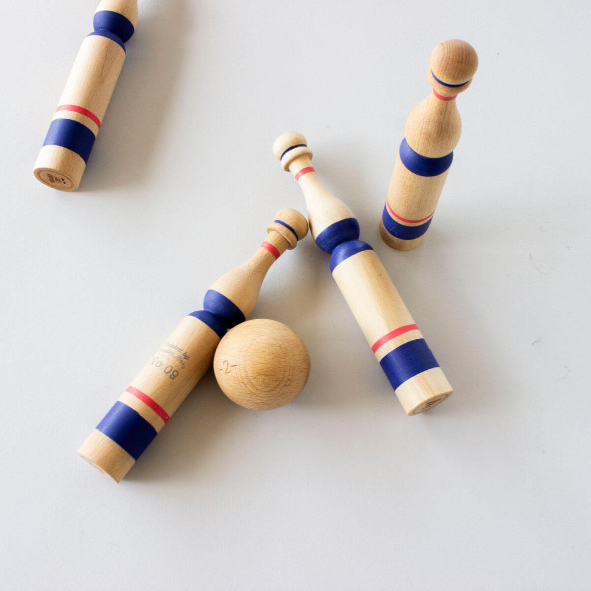 vintage wooden bowling set toy in blue by wooden story