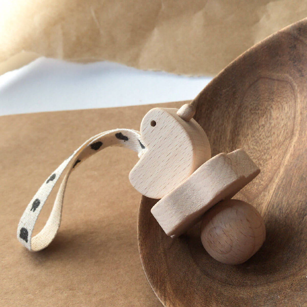 wooden rattle in duck design minus range by KMR childwood