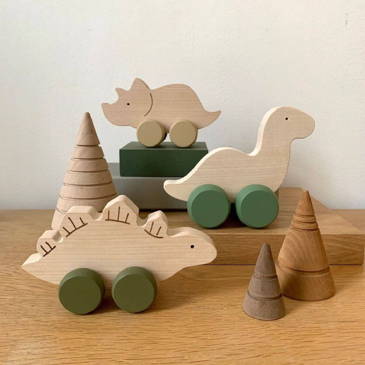 Wooden push along toy dinosaurs by briki vroom vroom