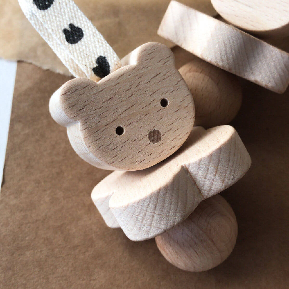 wooden rattle in bear design by KMR childwood