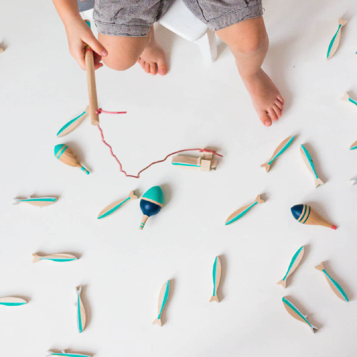 wooden spinning tops in fishing float design by eperfa