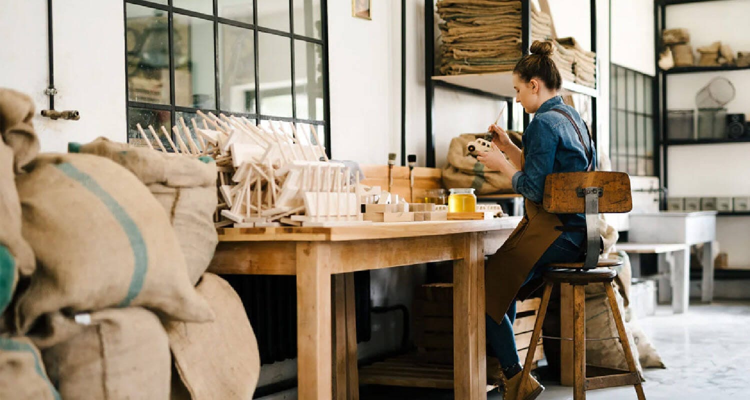 wooden story heirloom toy maker in woorkshop