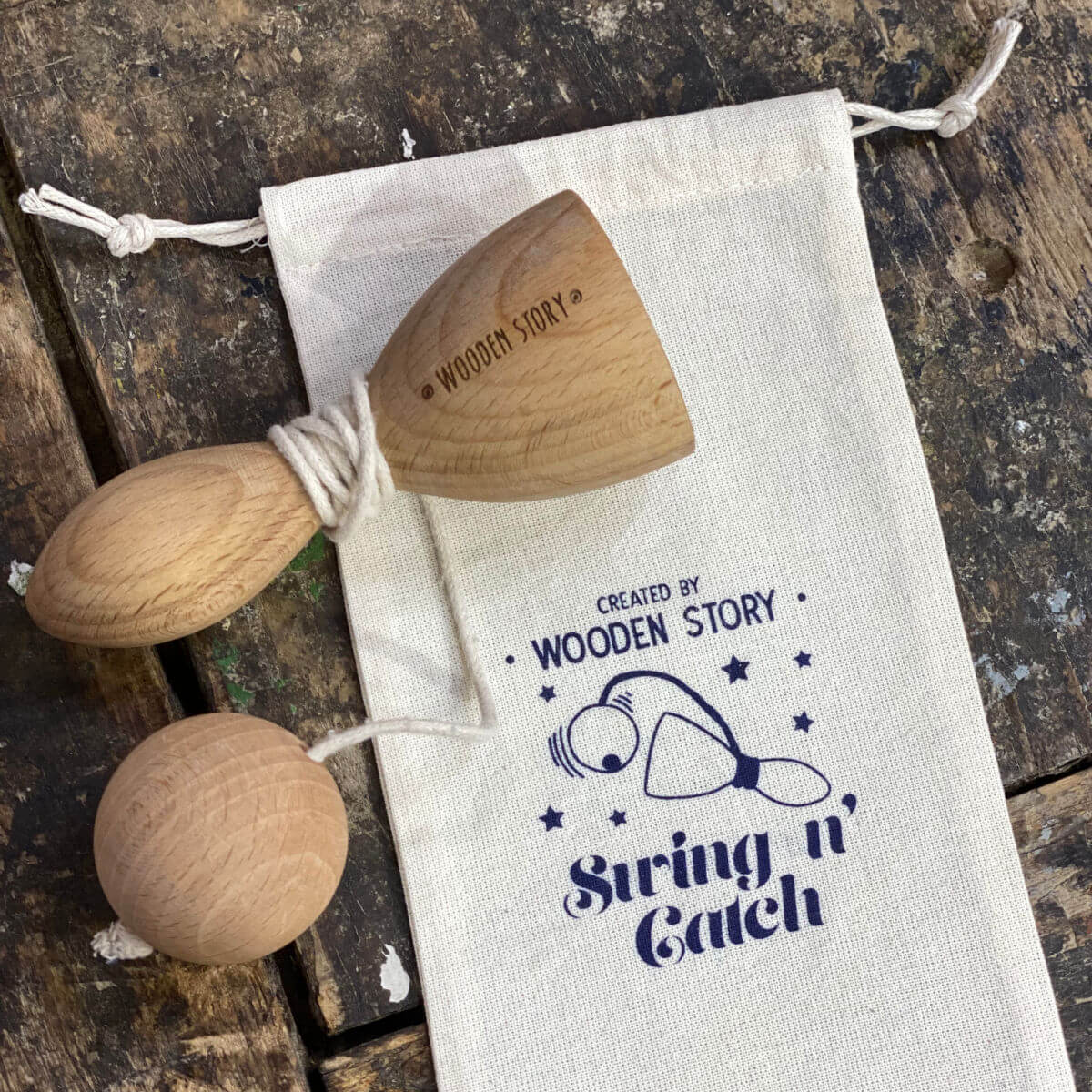 swing and catch cup by wooden story