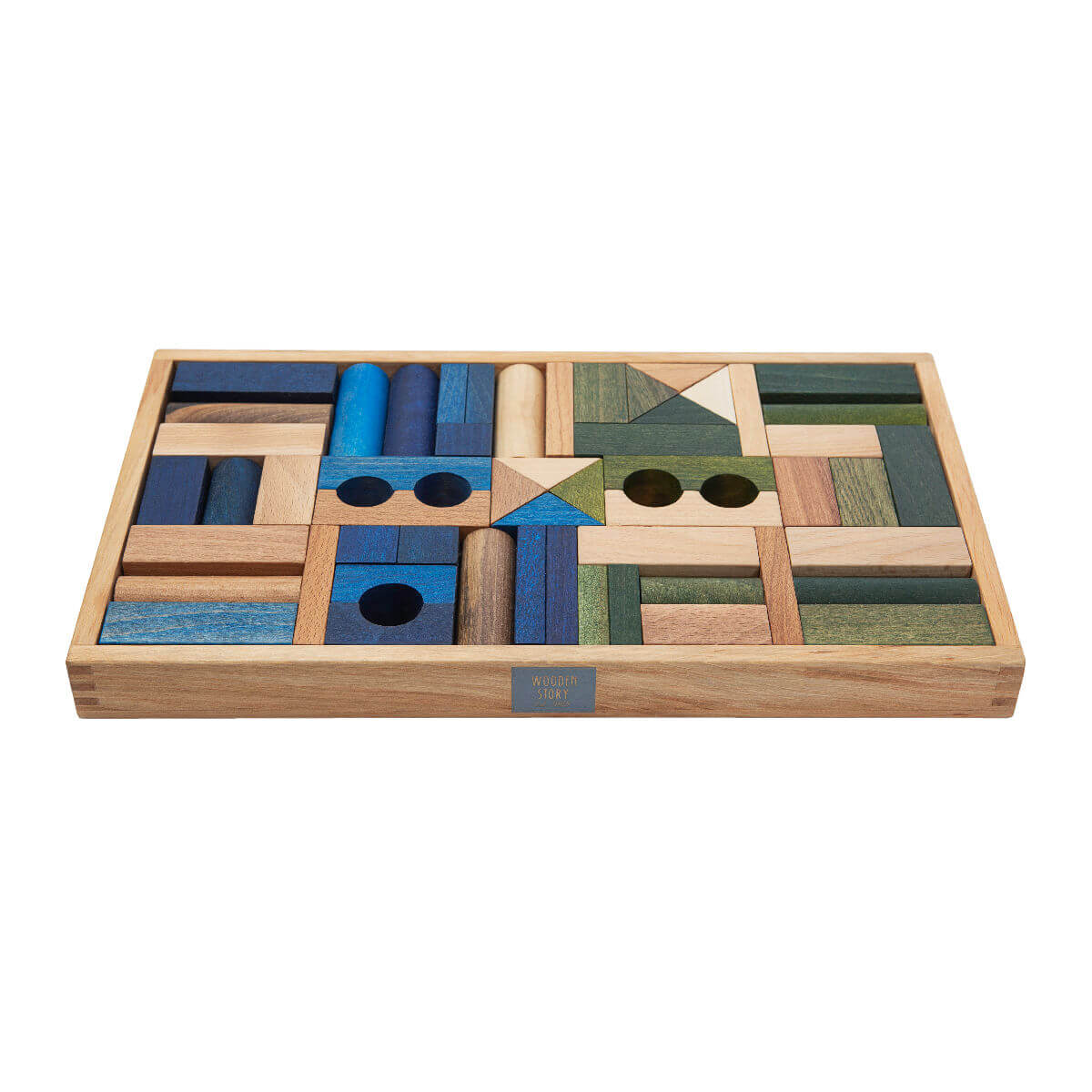 wooden building blocks in cool colours in tray by wooden story