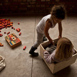 wooden blocks in tray in rainbow colours by wooden story