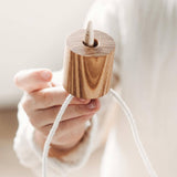 wooden needle threading toy by wooden story