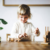 wooden needle threading toy by wooden story