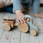 wooden tractor toy with trailer by friendly toys in sweetie Jane colour