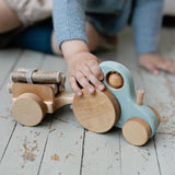 wooden tractor toy with trailer by friendly toys in sweetie Jane colour