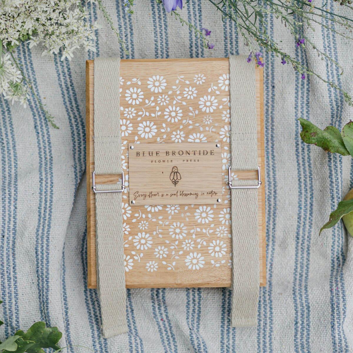 wooden flower press with straps in delicate daisy, flower pressing at blue brontide uk
